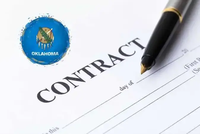 Contract document and pen with an Oklahoma emblem