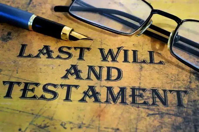 Last will and testament with pen and glasses