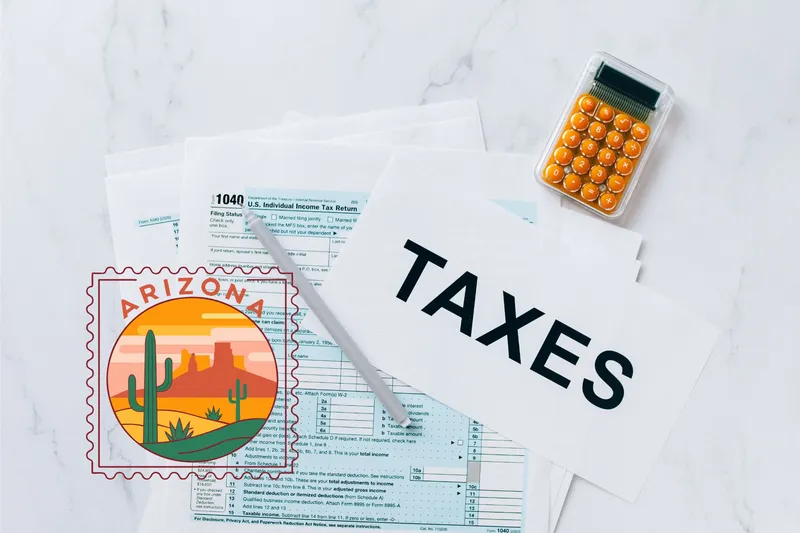 A capital gains calculator sits next to tax forms, a paper with the word 'TAXES', and an Arizona state logo on a white marble surface.