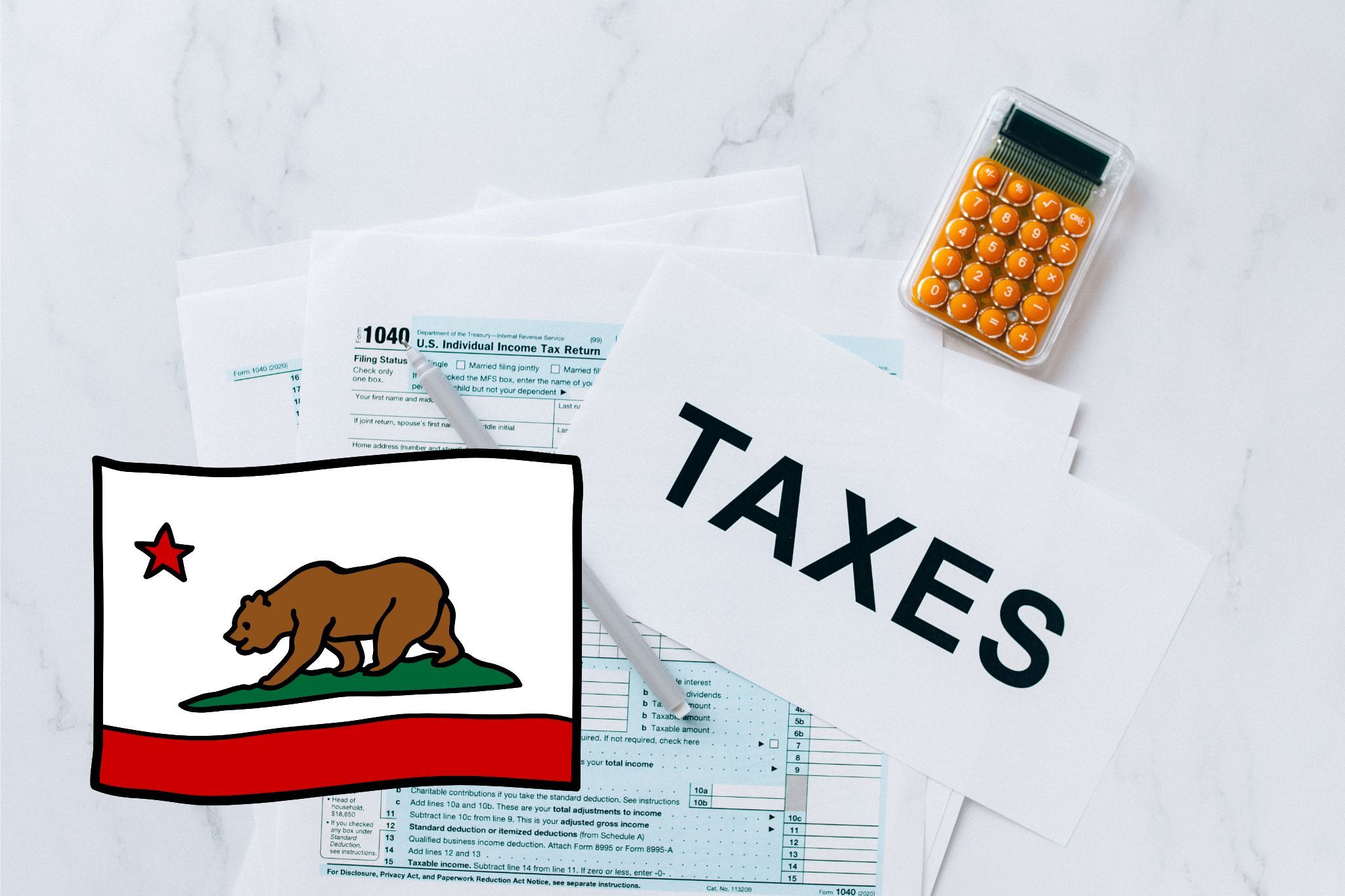 A capital gains calculator sits next to tax forms, a paper with the word 'TAXES', and an California state logo on a white marble surface.