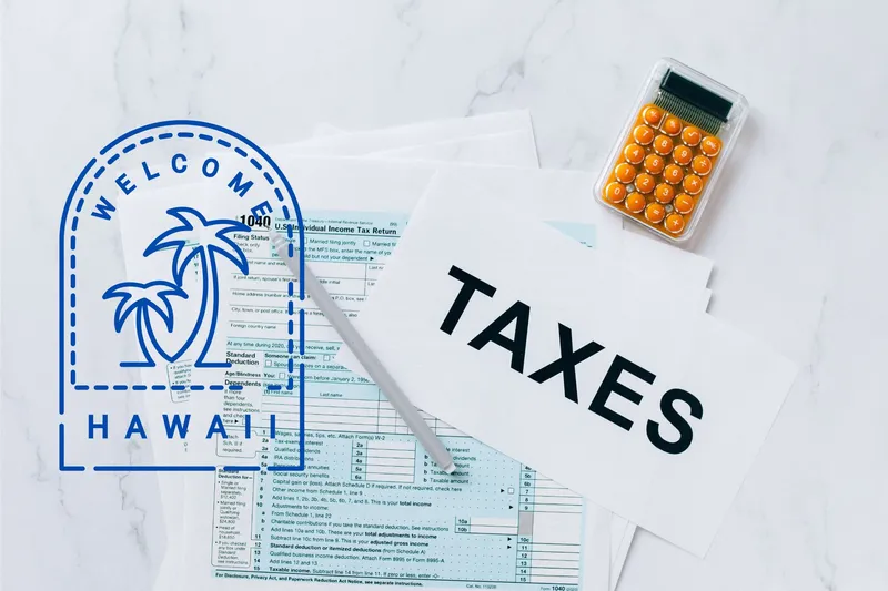 A capital gains calculator sits next to tax forms, a paper with the word 'TAXES', and an Hawaii state logo on a white marble surface.