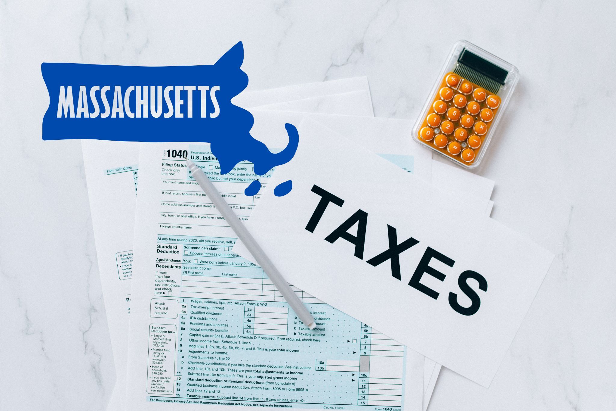 A capital gains calculator sits next to tax forms, a paper with the word 'TAXES', and an Massachusetts state logo on a white marble surface.