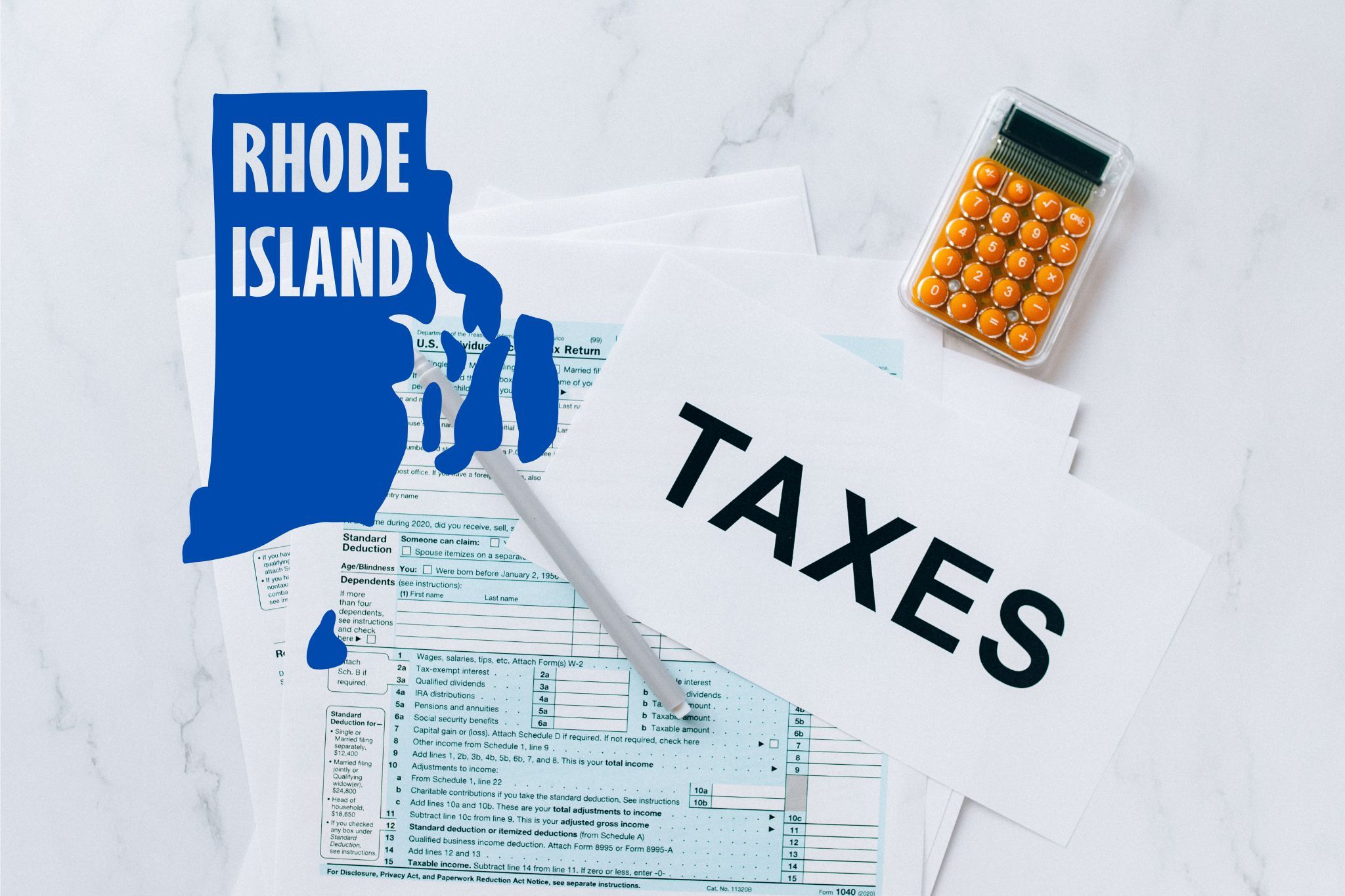 A capital gains calculator sits next to tax forms, a paper with the word 'TAXES', and an Rhode Island state logo on a white marble surface.