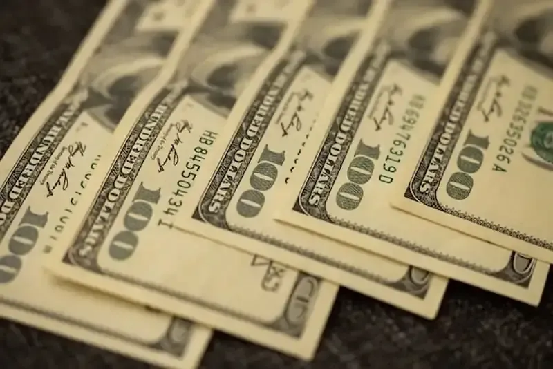 Cash laid out on table