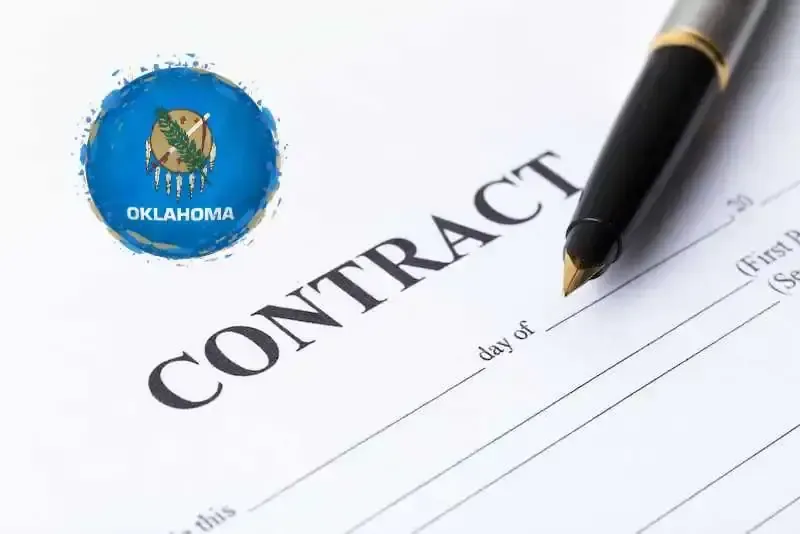 Contract document and pen with an Oklahoma emblem