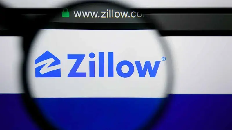 Magnifying glass centered on Zillow logo