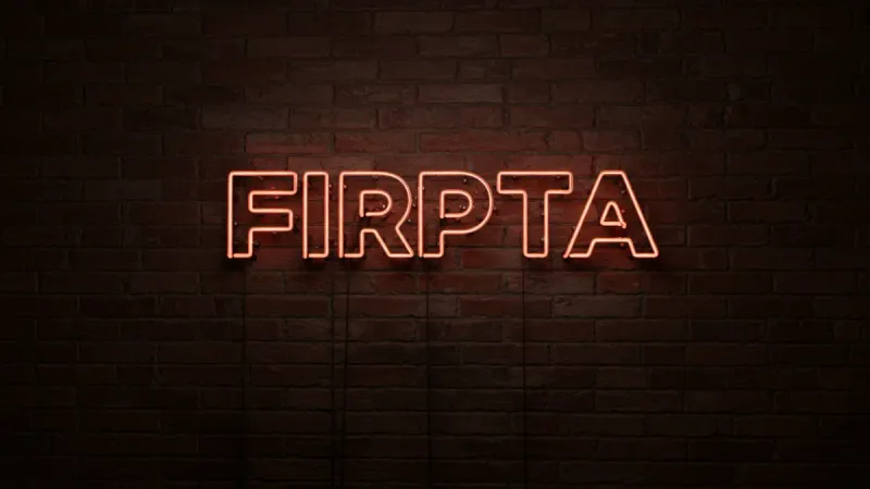 The word 'Tax' in neon letters on a dark background