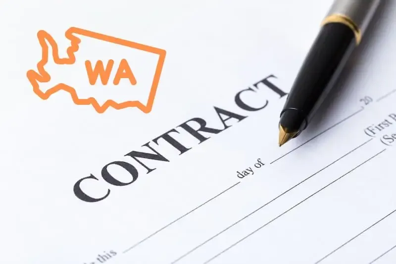 Contract document and pen with Washington state emblem